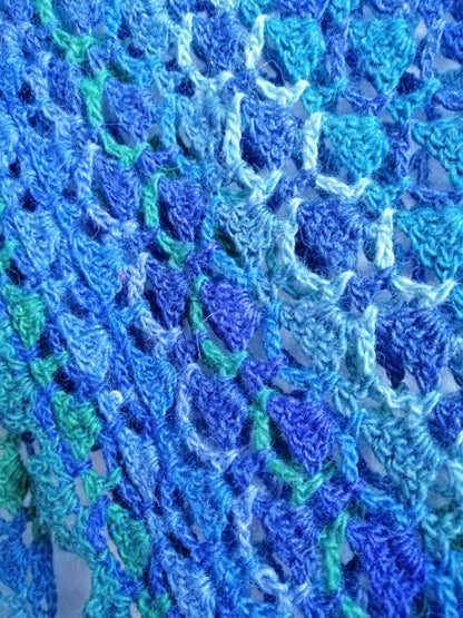 Close-up image of our hand crocheted 'Blue Geode Crochet Shawl'. The perfect gift for family and friends.