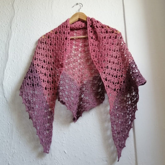 A hand crocheted shawl in light, medium and deep pink. Our 'Old Pink Crochet Shawl' is available for delivery in the UK.
